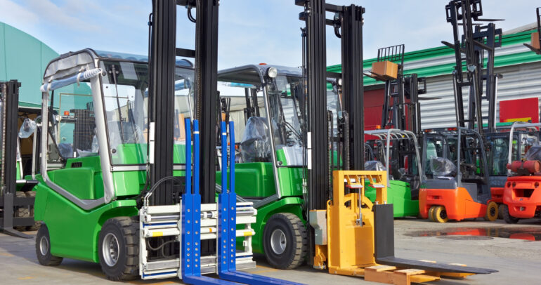 Electric forklift stackers in a row